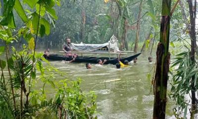 নৌকায় করে মরদেহ নেওয়া হলো কবরস্থানে